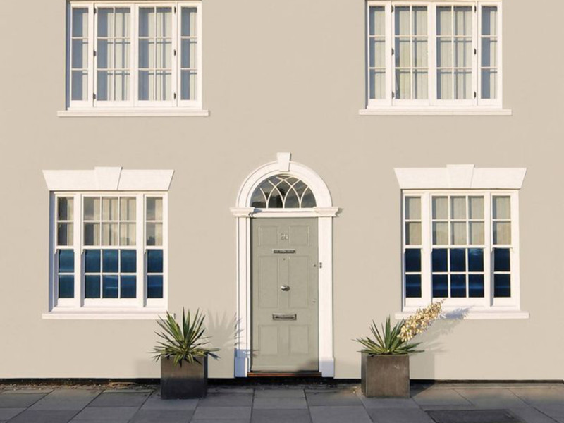 Elite Wall Coating application — transforming exterior masonry walls